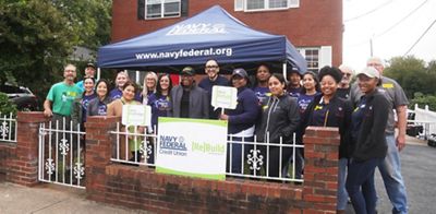 Navy Federal team does work on the front porch