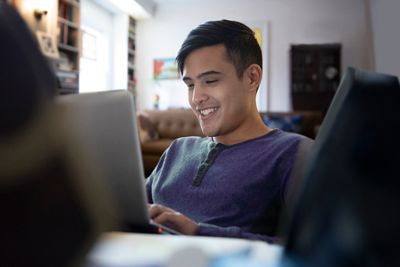 Teenager student working from home